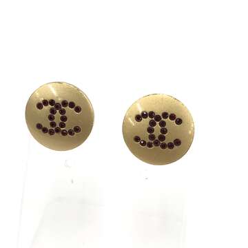 Chanel boucles d’oreilles avec strass rouge